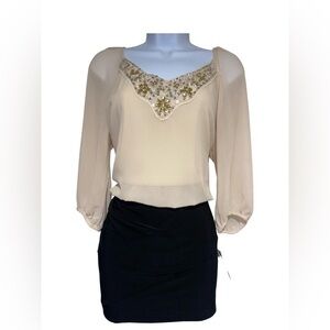 new with tags cream and black dress with 3/4 length sleeves